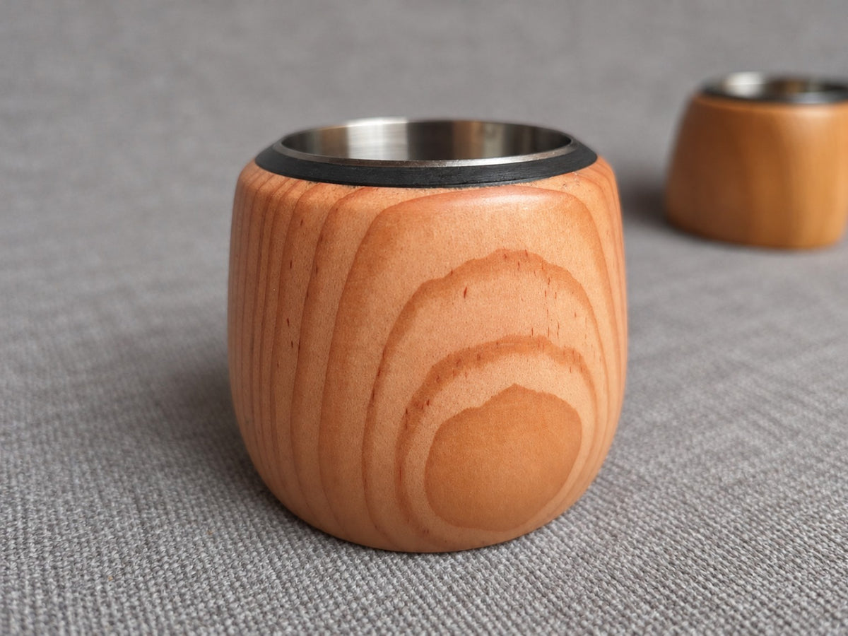 Detailed view of the curved grain on a holder from the cedar, Douglas fir and oak tealight trio